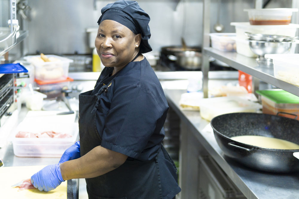 Woman working in kitchen