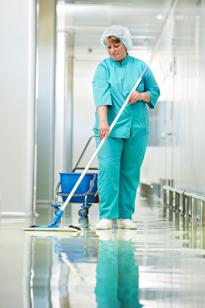 woman mopping hospital floor