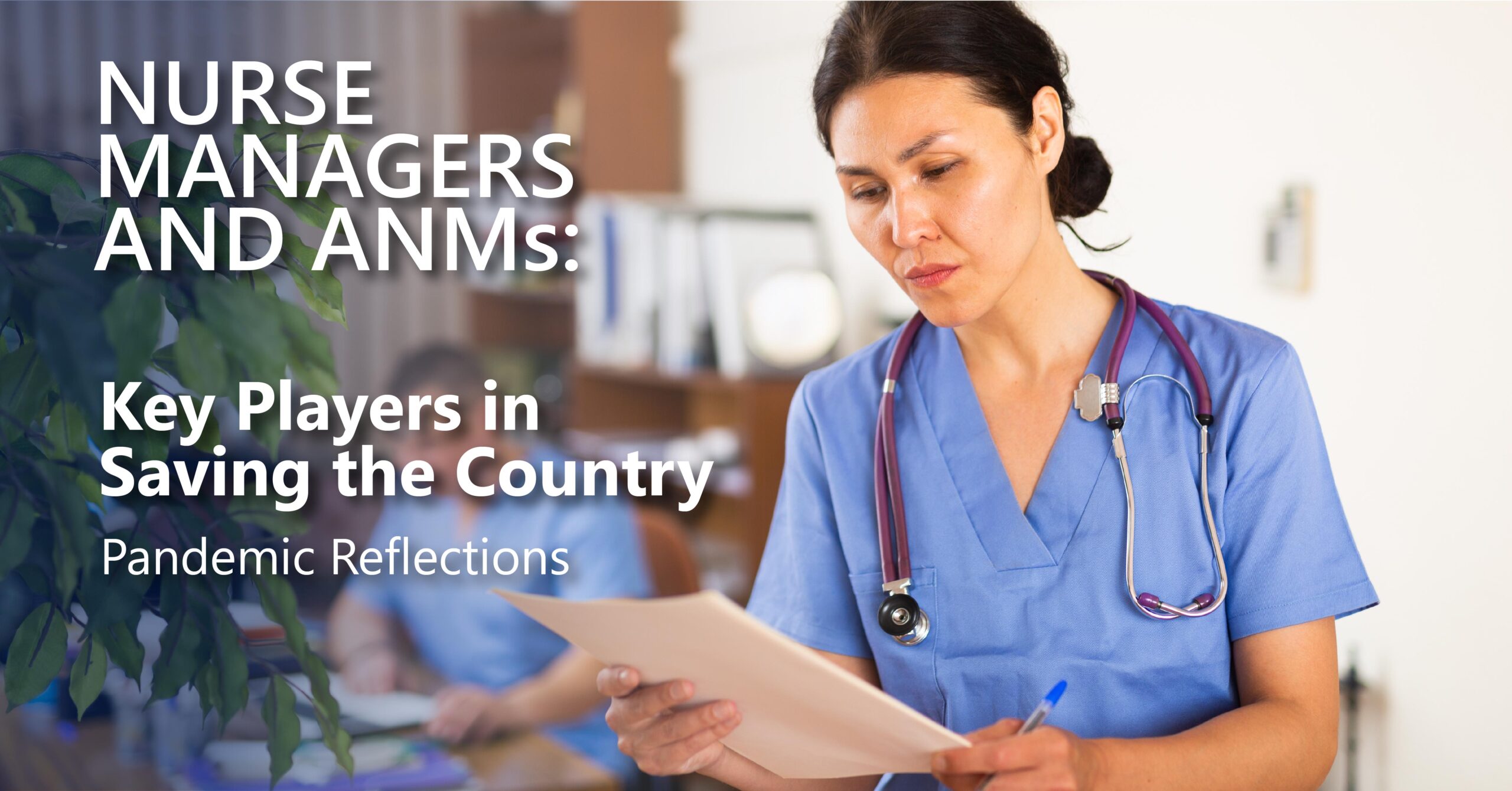 Image of nurse in blue scrubs looking over paperwork