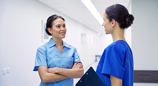 Healthcare workers conversing