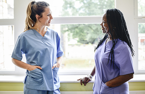 healthcare workers conversing