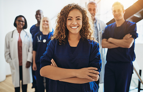 Proud ethnic woman healthcare worker